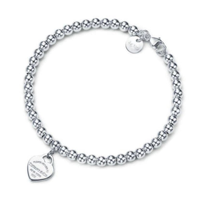 BRAZALETE RETURN TO TIFFANY CON CUENTAS Y PLACA ESTILO CORAZÓN Plata s925